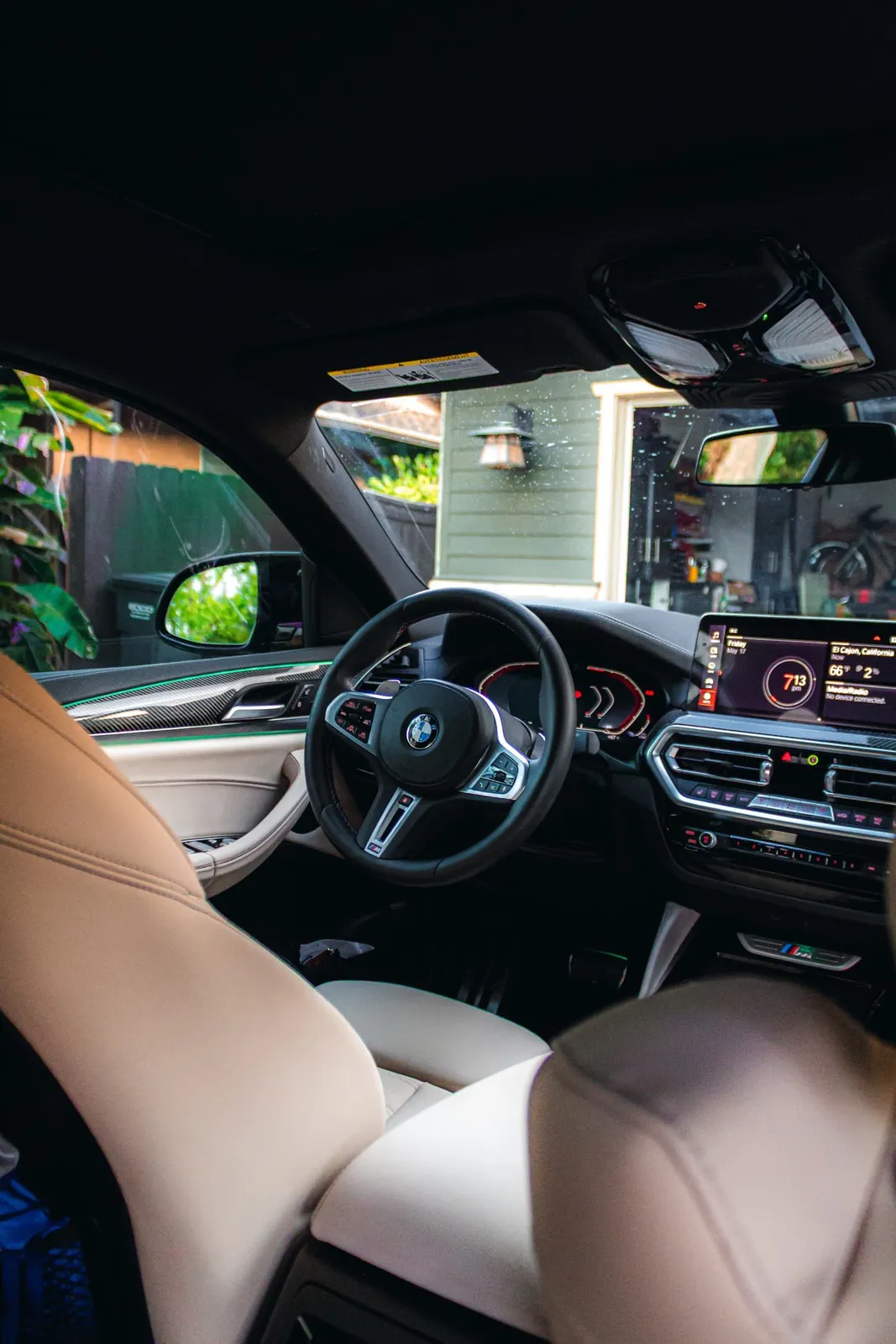 Clean tan leather BMW interior in Santee, CA, Joji's Mobile Detailing