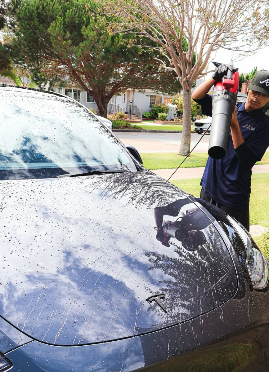 Joji's Mobile Detailing technician finishing an exterior wash in Alpine, CA
