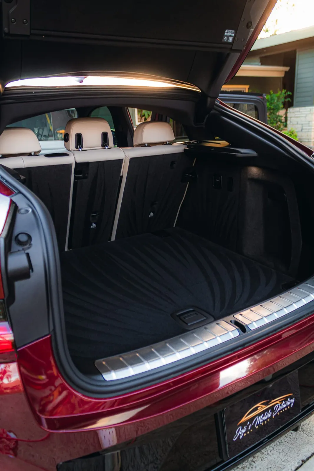 Detailed BMW trunk with Joji's Mobile Detailing branding in Point Loma, CA, Joji's Mobile Detailing